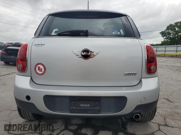 2012 MINI Countryman with VIN WMWZB3C5XCWM06778, listed as a Copart auction lot 61201285 with 64,676 mi miles and Salvage title. Bid and sale history available at DreamBid. Image 6.