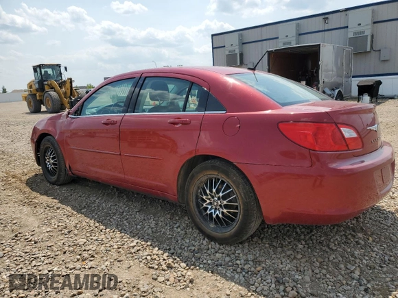 2010 Chrysler Sebring Limited with VIN 1C3CC5FD1AN197099, listed as a Copart auction lot 59128825 with 85,736 mi miles and Salvage title. Bid and sale history available at DreamBid. Image 2.