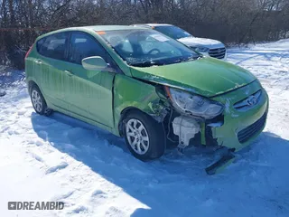 2013 Hyundai Accent GL with VIN KMHCT5AE5DU115490, listed as a IAAI auction lot 41598395 with 86,610 mi miles. Bid and sale history available at carsss.com. Image 1.