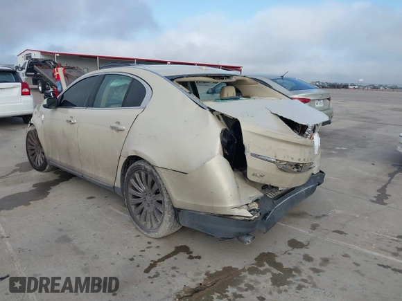 2015 Lincoln MKS with VIN 1LNHL9DKXFG607951, listed as a IAAI auction lot 40807752 with 207,097 mi miles. Bid and sale history available at carsss.com. Image 3.