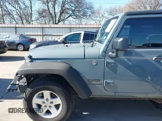 2014 Jeep Wrangler Sport with VIN 1C4AJWAGXEL177449, listed as a IAAI auction lot 41741519 with 117,056 mi miles and . Bid and sale history available at carsss.com. Image 17.