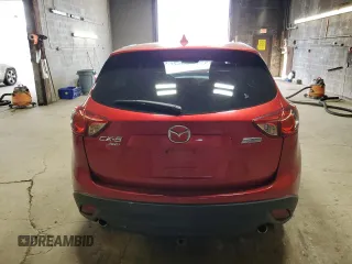 2015 Mazda CX-5 Touring with VIN JM3KE4CY0F0447480, listed as a Copart auction lot 53031845 with 70,724 mi miles and Salvage Title. Bid and sale history available at carsss.com. Image 6.