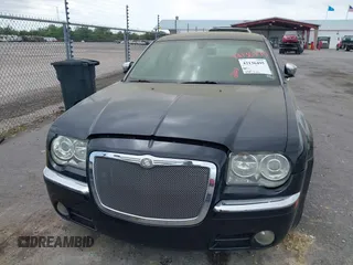 2007 Chrysler 300 C with VIN 2C3LA63H97H861511, listed as a IAAI auction lot 42136495 with 113,972 mi miles. Bid and sale history available at carsss.com. Image 6.