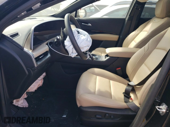 2024 Cadillac XT4 AWD Luxury with VIN 1GYFZBR4XRF199970, listed as a Copart auction lot 71496774 with 4,512 mi miles and Salvage Title. Bid and sale history available at carsss.com. Image 7.