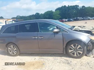 2015 Honda Odyssey Touring Elite with VIN 5FNRL5H95FB127156, listed as a IAAI auction lot 42618059 with 160,074 mi miles and . Bid and sale history available at DreamBid. Image 13.