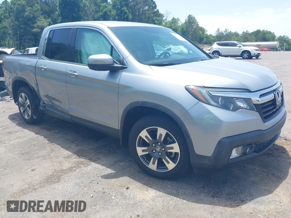 2018 Honda Ridgeline RTL z VIN 5FPYK2F5XJB001064, wystawiony jako IAAI lot #42252956 z przebiegiem 95 272 mil mil oraz . Historia ofert i sprzedaży dostępna na DreamBid. Obrazek 1.
