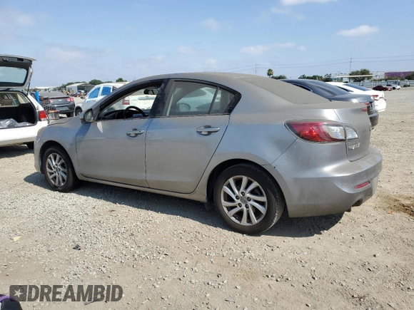 2012 Mazda 3 i Touring with VIN JM1BL1V86C1557191, listed as a Copart auction lot 63002985 with 218,863 mi miles and Clean title. Bid and sale history available at DreamBid. Image 2.
