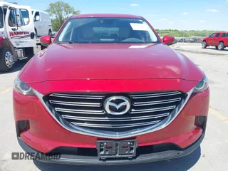 2016 Mazda CX-9 Touring with VIN JM3TCBCY5G0104504, listed as a IAAI auction lot 42314649 with 116,536 mi miles and . Bid and sale history available at DreamBid. Image 12.