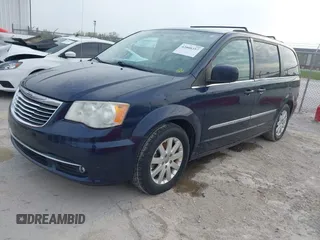 2013 Chrysler Town & Country Touring with VIN 2C4RC1BG4DR707032, listed as a IAAI auction lot 42008357 with 183,104 mi miles and . Bid and sale history available at DreamBid. Image 2.