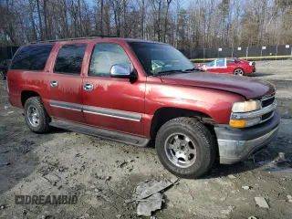 2002 Chevrolet Suburban LS with VIN 1GNEC16Z42J319902, listed as a Copart auction lot 47227475 with 217,216 mi miles and Salvage title. Bid and sale history available at DreamBid. Image 4.