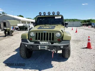 2013 Jeep Wrangler Unlimited Rubicon with VIN 1C4BJWFG0DL587057, listed as a Copart auction lot 57362535 with 102,684 mi miles and Salvage title. Bid and sale history available at DreamBid. Image 14.