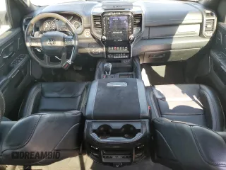 2021 Ram 1500 with VIN NCS107300, listed as a Copart auction lot 44147135 with 25,120 mi miles and Salvage title. Bid and sale history available at DreamBid. Image 8.
