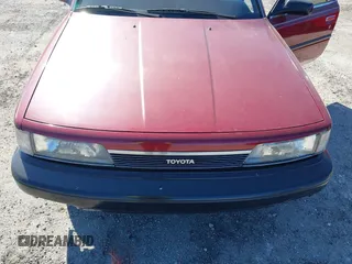 1989 Toyota Camry DLX с VIN 4T1SV21E9KU059104, выставлен на аукционе IAAI как лот 41014925 с пробегом 312 844 миль миль и . История ставок и продаж доступна на DreamBid. Изображение 6.