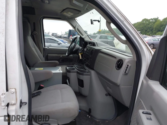 2014 Ford Econoline Cargo Commercial with VIN 1FTNE2EL6EDB13764, listed as a IAAI auction lot 42647684 with 99,876 mi miles and . Bid and sale history available at DreamBid. Image 5.