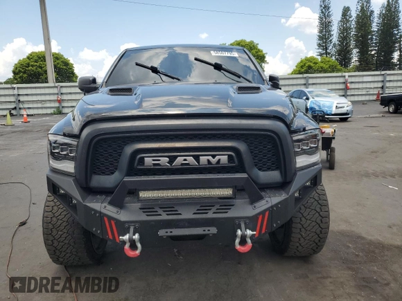 2016 Ram 1500 Rebel z VIN 1C6RR7YT0GS336788, wystawiony jako Copart lot #58507795 z przebiegiem Nie podano mil oraz Szkody całkowita. Historia ofert i sprzedaży dostępna na DreamBid. Obrazek 5.