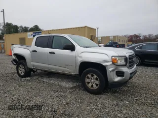 2016 GMC Canyon 2WD with VIN 1GTG5BEA3G1311780, listed as a Copart auction lot 83823634 with 102,466 mi miles and Salvage Title. Bid and sale history available at carsss.com. Image 4.