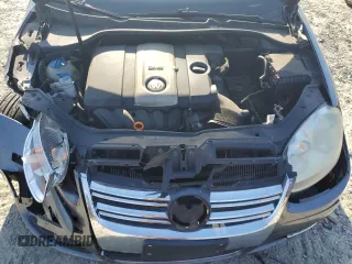 2006 Volkswagen Jetta z VIN 3VWDG71K26M673879, wystawiony jako Copart lot #75674634 z przebiegiem 93 689 mil mil oraz Szkoda całkowita • Salvage title. Historia ofert i sprzedaży dostępna na DreamBid. Obrazek 11.