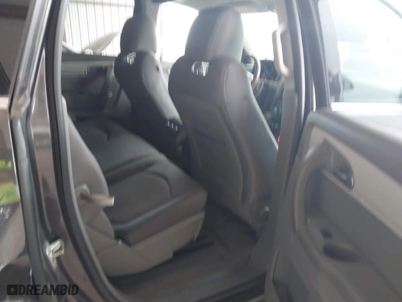 2015 Chevrolet Traverse LT with VIN 1GNKRGKD7FJ318232, listed as a IAAI auction lot 41590749 with 77,291 mi miles. Bid and sale history available at carsss.com. Image 8.