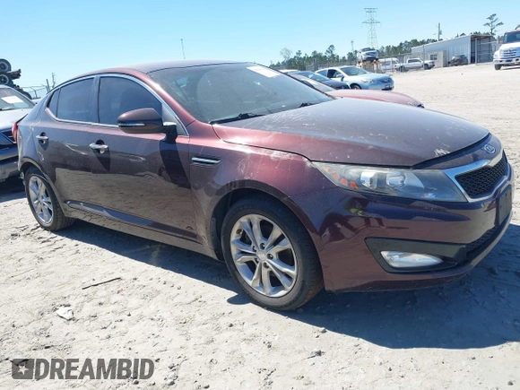 2012 Kia Optima EX with VIN 5XXGN4A73CG071036, listed as a IAAI auction lot 41849926 with 147,448 mi miles. Bid and sale history available at carsss.com. Image 1.
