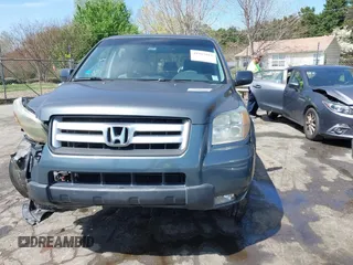 2006 Honda Pilot EX with VIN 2HKYF18416H529290, listed as a IAAI auction lot 41915915 with 135,385 mi miles and . Bid and sale history available at DreamBid. Image 12.