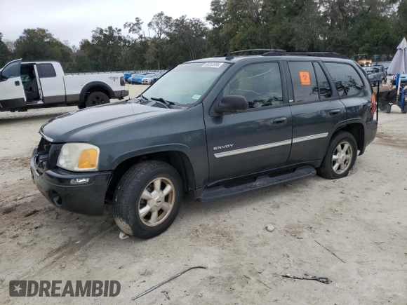 2006 GMC Envoy SLE with VIN 1GKDS13S562135135, listed as a Copart auction lot 88353995 with 159,251 mi miles and Salvage Title. Bid and sale history available at carsss.com. Image 1.