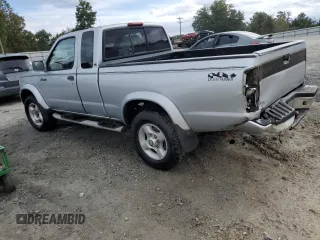 2000 Nissan Frontier XE with VIN 1N6ED26T0YC314102, listed as a Copart auction lot 83678264 with 174,419 mi miles and Salvage title. Bid and sale history available at DreamBid. Image 2.