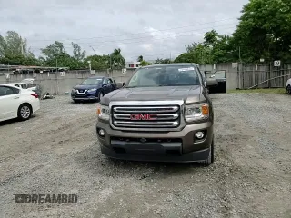 2015 GMC Canyon 4WD SLE with VIN 1GTG6BE38F1263139, listed as a Copart auction lot 75479854 with 124,765 mi miles and Salvage Title. Bid and sale history available at carsss.com. Image 10.
