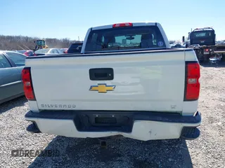2017 Chevrolet Silverado 1500 LT with VIN 3GCUKREC3HG489701, listed as a IAAI auction lot 41814860 with 218,605 mi miles. Bid and sale history available at carsss.com. Image 16.