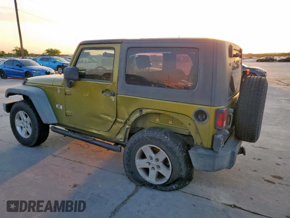 2008 Jeep Wrangler X with VIN 1J4FA24148L617265, listed as a Copart auction lot 53054495 with 143,270 mi miles and Salvage Title. Bid and sale history available at DreamBid. Image 2.