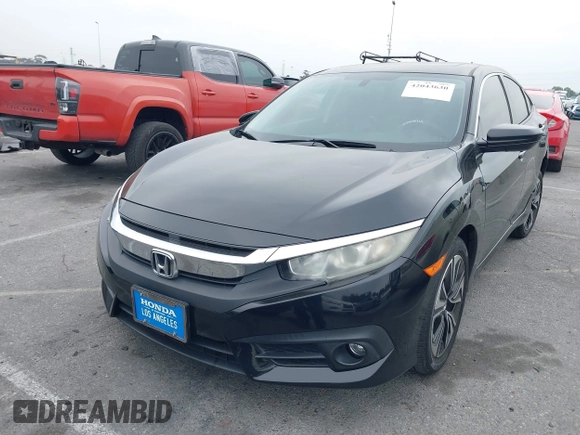 2016 Honda Civic Sedan EX-T with VIN 2HGFC1F34GH645220, listed as a IAAI auction lot 42043630 with 55,301 mi miles. Bid and sale history available at carsss.com. Image 17.