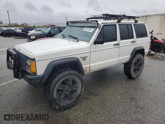 1989 Jeep Cherokee z VIN 1J4FT28LXKL601505, wystawiony jako Copart lot #49312265 z przebiegiem 264 769 mil mil oraz Szkoda całkowita • Salvage title. Historia ofert i sprzedaży dostępna na DreamBid. Obrazek 1.