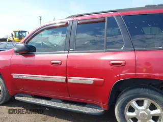 2005 GMC Envoy SLE with VIN 1GKDT13S252127604, listed as a IAAI auction lot 41898390 with 210,655 mi miles. Bid and sale history available at carsss.com. Image 14.