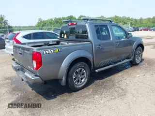 2016 Nissan Frontier Pro-4X with VIN 1N6AD0EVXGN765434, listed as a IAAI auction lot 42485545 with 109,331 mi miles and . Bid and sale history available at DreamBid. Image 4.