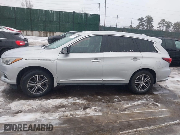 2016 Infiniti QX60 with VIN 5N1AL0MMXGC505959, listed as a IAAI auction lot 41513268 with 130,142 mi miles and . Bid and sale history available at DreamBid. Image 14.