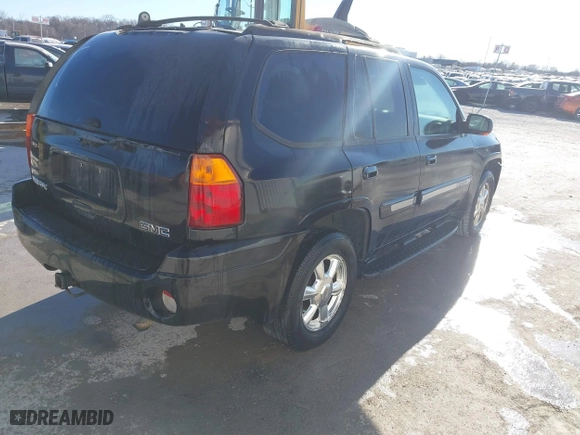 2005 GMC Envoy SLE with VIN 1GKDT13S952288760, listed as a IAAI auction lot 41671656 with 1 mi miles. Bid and sale history available at carsss.com. Image 4.