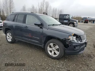 2014 Jeep Compass Latitude with VIN 1C4NJDEB4ED601769, listed as a Copart auction lot 48901365 with 129,826 mi miles and Salvage Title. Bid and sale history available at carsss.com. Image 4.