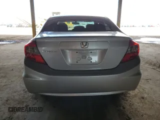 2012 Honda Civic LX z VIN 2HGFB2F59CH580899, wystawiony jako Copart lot #59803775 z przebiegiem 96 323 mil mil oraz Szkoda całkowita • Salvage title. Historia ofert i sprzedaży dostępna na DreamBid. Obrazek 6.