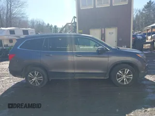 2017 Honda Pilot EX-L z VIN 5FNYF6H63HB027591, wystawiony jako IAAI lot #41854366 z przebiegiem 113 178 mil mil oraz . Historia ofert i sprzedaży dostępna na DreamBid. Obrazek 13.