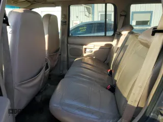 2001 Ford Explorer Eddie Bauer z VIN 1FMZU84P11UB51758, wystawiony jako Copart lot #77895184 z przebiegiem 191 464 mil mil oraz Szkoda całkowita • Salvage title. Historia ofert i sprzedaży dostępna na DreamBid. Obrazek 11.