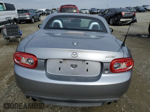 2015 Mazda MX-5 Miata Grand Touring z VIN JM1NC2PF1F0238984, wystawiony jako Copart lot #80347224 z przebiegiem 54 699 mil mil oraz Szkody całkowita. Historia ofert i sprzedaży dostępna na DreamBid. Obrazek 6.