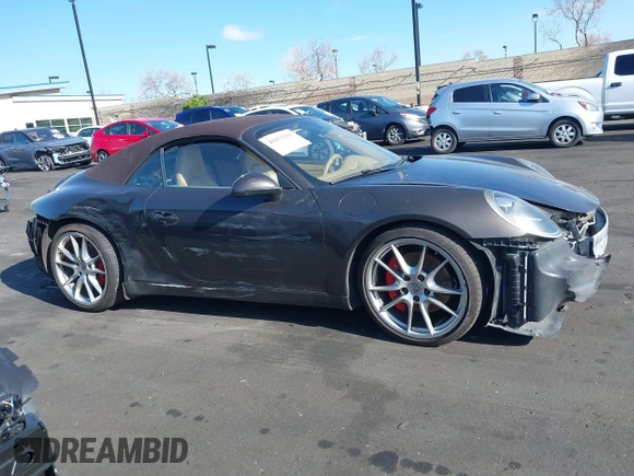 2012 Porsche 911 Carrera S with VIN WP0CB2A98CS154934, listed as a IAAI auction lot 41871101 with 69,411 mi miles and . Bid and sale history available at DreamBid. Image 14.