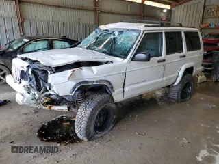 1998 Jeep Cherokee Sport with VIN 1J4FJ68S7WL264740, listed as a Copart auction lot 59078465 with 147,318 mi miles and Salvage title. Bid and sale history available at DreamBid. Image 1.