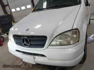 2000 Mercedes-Benz M-Class with VIN 4JGAB54E2YA166846, listed as a IAAI auction lot 41744657 with 226,711 mi miles. Bid and sale history available at carsss.com. Image 6.