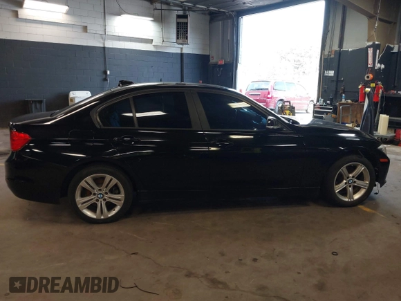 2014 BMW 3 Series 328i xDrive with VIN WBA3B3G50ENR83599, listed as a IAAI auction lot 42106340 with 195,309 mi miles. Bid and sale history available at carsss.com. Image 13.