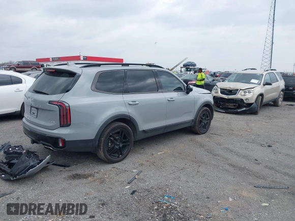 2024 Kia Telluride EX X-Line z VIN 5XYP3DGC2RG496309, wystawiony jako IAAI lot #41804549 z przebiegiem 16 785 mil mil oraz . Historia ofert i sprzedaży dostępna na DreamBid. Obrazek 4.