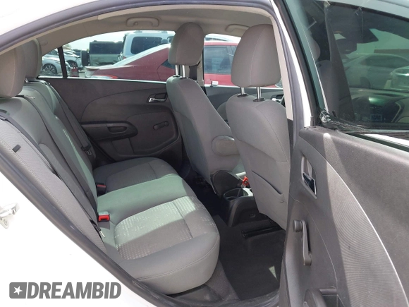 2013 Chevrolet Sonic LS with VIN 1G1JA5SH9D4249356, listed as a IAAI auction lot 42373352 with 151,337 mi miles and . Bid and sale history available at DreamBid. Image 8.