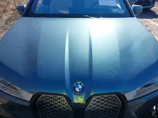 2025 BMW iX xDrive50 z VIN WB523CF09SCS94052, wystawiony jako IAAI lot #41822349 z przebiegiem 1233 mil mil oraz . Historia ofert i sprzedaży dostępna na DreamBid. Obrazek 10.