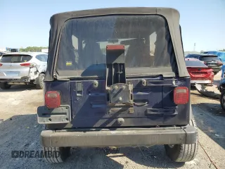 1998 Jeep Wrangler SE with VIN 1J4FY29P0WP784334, listed as a Copart auction lot 52384075 with 0 mi miles and Salvage Title. Bid and sale history available at carsss.com. Image 6.