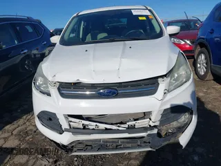 2016 Ford Escape SE with VIN 1FMCU0G97GUA80692, listed as a IAAI auction lot 41860124 with 122,251 mi miles. Bid and sale history available at carsss.com. Image 12.