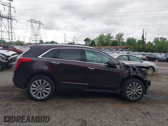 2017 Cadillac XT5 Platinum AWD z VIN 1GYKNFRS2HZ224860, wystawiony jako IAAI lot #42272142 z przebiegiem 95 697 mil mil oraz . Historia ofert i sprzedaży dostępna na DreamBid. Obrazek 13.